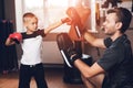 Father and son in the gym. Father and son spend time together and lead a healthy lifestyle. Royalty Free Stock Photo