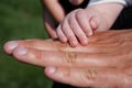 Father and son hands, adult and baby hands, fingers