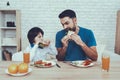 Father and Son Have a Breakfast Royalty Free Stock Photo