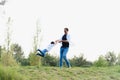 Father and son have fun together in nature. Father and son playing. People having fun outdoors. Concept of friendly family