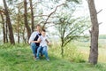 Father and son have fun together in nature. Father and son playing. People having fun outdoors. Concept of friendly family