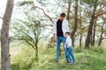 Father and son have fun together in nature. Father and son playing. People having fun outdoors. Concept of friendly family