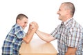 Father and son having fun with arm wrestling Royalty Free Stock Photo