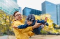 Father with son having fun in autumn tokyo city Royalty Free Stock Photo