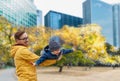 Father with son having fun in autumn tokyo city Royalty Free Stock Photo