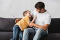 Father and son having fun while Royalty Free Stock Photo