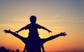 Father and son having fun at sunset Royalty Free Stock Photo