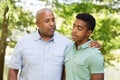 Father and son having a serious conversation. Royalty Free Stock Photo