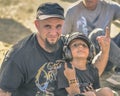Father and son in Hellfest, heavy metal festival