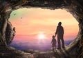 Father and son holding hand in hand on tombstone sunset Royalty Free Stock Photo