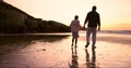 Father, son and holding hands at beach, sunset and support or trust, ocean and solidarity or care. Black family, sea and Royalty Free Stock Photo