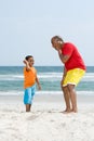 Father and son holding shells Royalty Free Stock Photo
