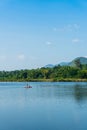 Father and son kayaking on the lake somewhere in Kanchanaburi, Thailand Royalty Free Stock Photo