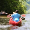 Father and son kayaking on the river Royalty Free Stock Photo