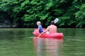 Father and son kayaking on the river Royalty Free Stock Photo