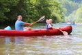 Father and son kayaking on the river Royalty Free Stock Photo