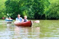 Father and son kayaking on the river Royalty Free Stock Photo