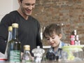 Father And Son In Kitchen Royalty Free Stock Photo