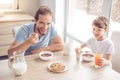 Father and son in kitchen Royalty Free Stock Photo