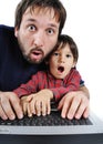 Father and son on laptop Royalty Free Stock Photo