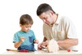 Father and son make nesting box together Royalty Free Stock Photo