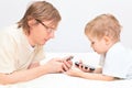 Father and son with mobile phones at home Royalty Free Stock Photo