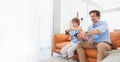 Father and son play video game Royalty Free Stock Photo