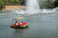 Father and son play water bike boat Royalty Free Stock Photo