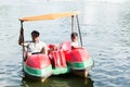 Father and son play water bike boat Royalty Free Stock Photo