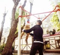 Father with son on playground training, happy real family smiling outside, lifestyle people concept Royalty Free Stock Photo