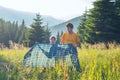 Father and son are playing on the alpine meadow Royalty Free Stock Photo