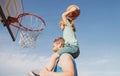 Father and son playing basketball. Dad and child spending time together. Royalty Free Stock Photo