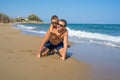 Father and Son Playing on the Beach, Having Quality Family Time Together. Greece. Royalty Free Stock Photo