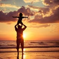 Father and son playing on the beach at the sunset time. Royalty Free Stock Photo