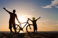 Father and son playing on the beach at the sunset time. Royalty Free Stock Photo