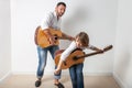 Father and son playing guitars Royalty Free Stock Photo