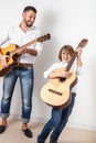 Father and son playing guitars Royalty Free Stock Photo