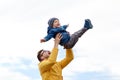 Father with son playing and having fun outdoors Royalty Free Stock Photo