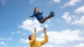 Father with son playing and having fun outdoors Royalty Free Stock Photo