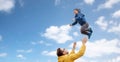 Father with son playing and having fun outdoors Royalty Free Stock Photo