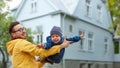 Father with son playing and having fun outdoors Royalty Free Stock Photo