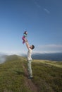 Father and son playing in the mountains. Royalty Free Stock Photo