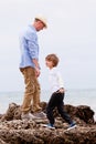 Father and son playing outdoor on beach summer