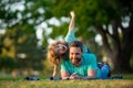 Father and son playing outdoor park in summer. Weekend activity happy family lifestyle concept. Concept of healthy Royalty Free Stock Photo