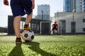 Father and son playing soccer, practicing shots on goal at stadium Royalty Free Stock Photo