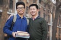 Father and son portrait in front of dormitory