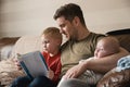 Father and Son Reading a Book Royalty Free Stock Photo