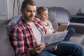 Father and son reading at home Royalty Free Stock Photo