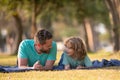 Father and son relaxing on nature in park. Weekend activity happy family lifestyle concept. Childhood and parenting Royalty Free Stock Photo