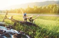 Father and son rest together in green grass when have bicycle wa Royalty Free Stock Photo